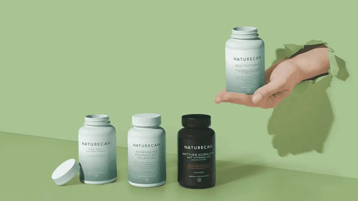 hand coming out of the wall holding cbd products