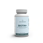 Naturecan Biotin+ supplement bottle on a white background