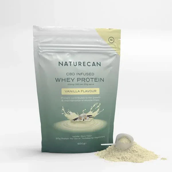 Naturecan CBD Whey Protein Powder in vanilla flavor, with a scoop of powder beside the package.