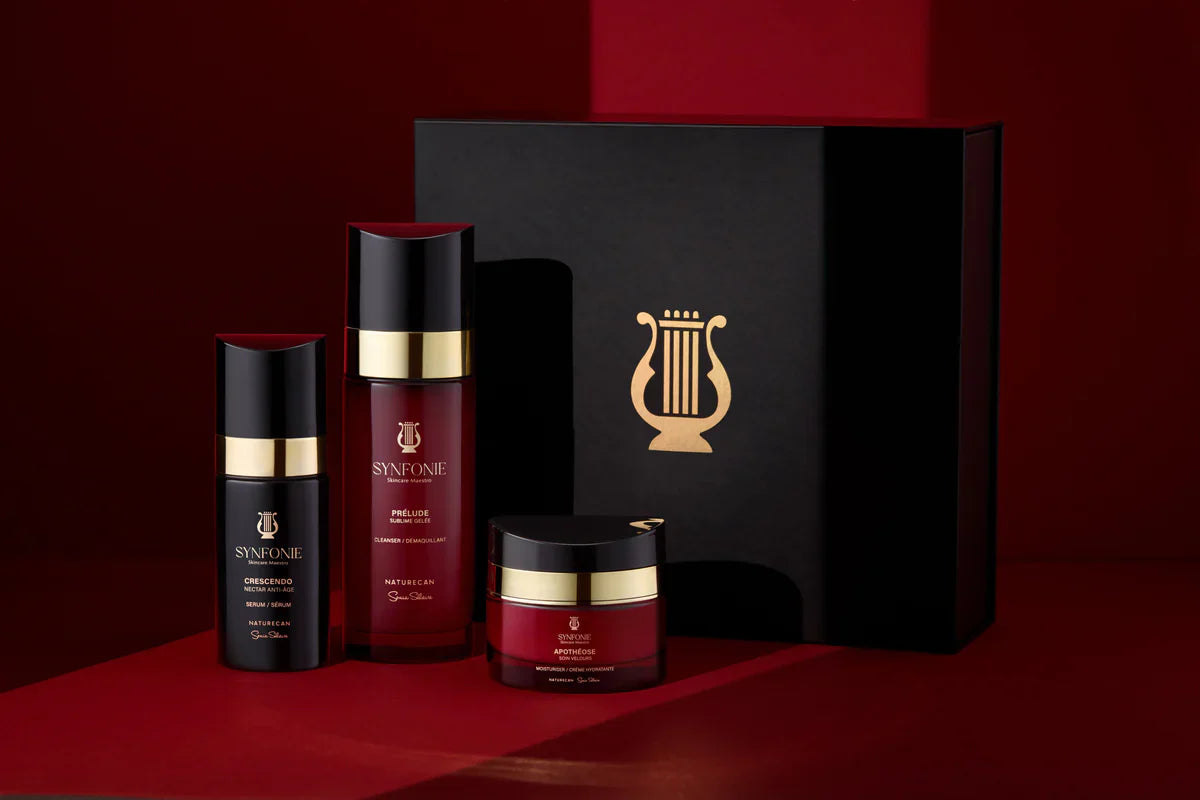 Cosmetic set with bottles and a jar on a red background, featuring a prominent logo.