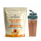 Naturecan Clear Whey Protein package and peach ice tea shake on a white background