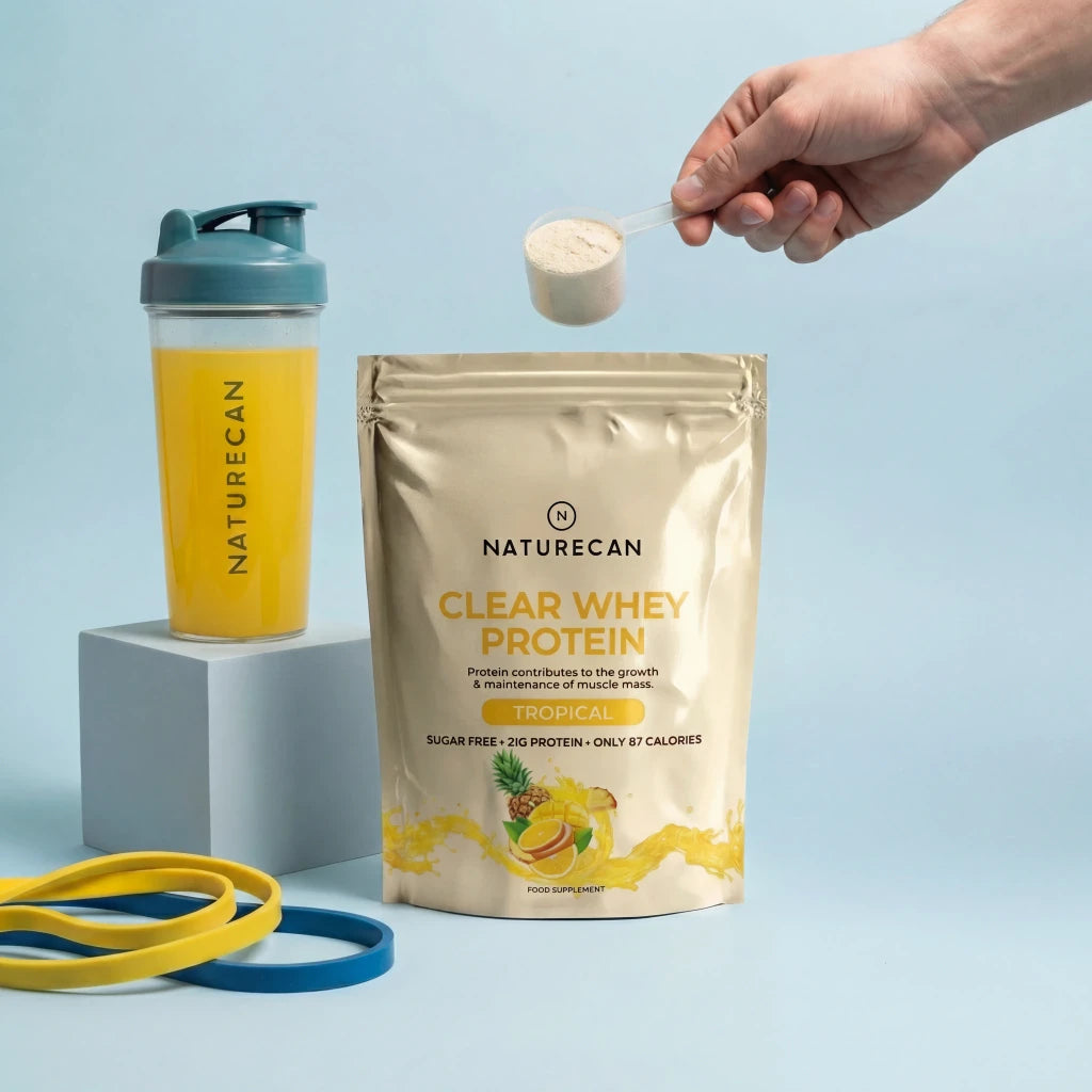 Naturecan Clear Whey Protein package with a shaker and protein powder on a light blue background