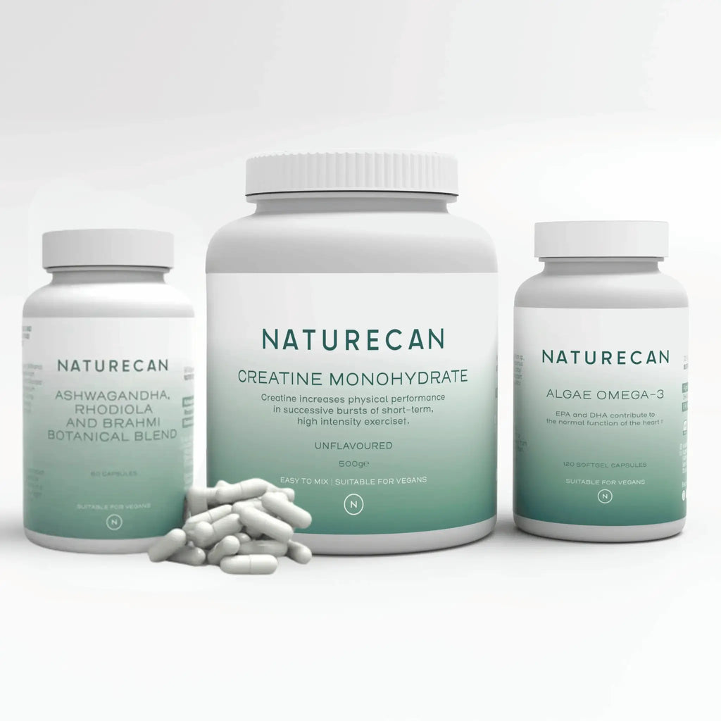Naturecan supplements featuring Ashwagandha blend, Creatine Monohydrate, and Algae Omega-3 bottles with capsules.