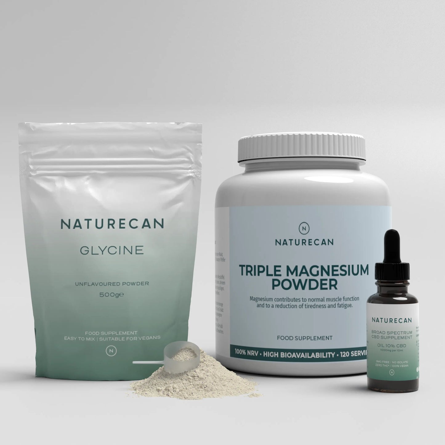Naturecan glycine powder, triple magnesium powder, and CBD oil bottle on a light background.