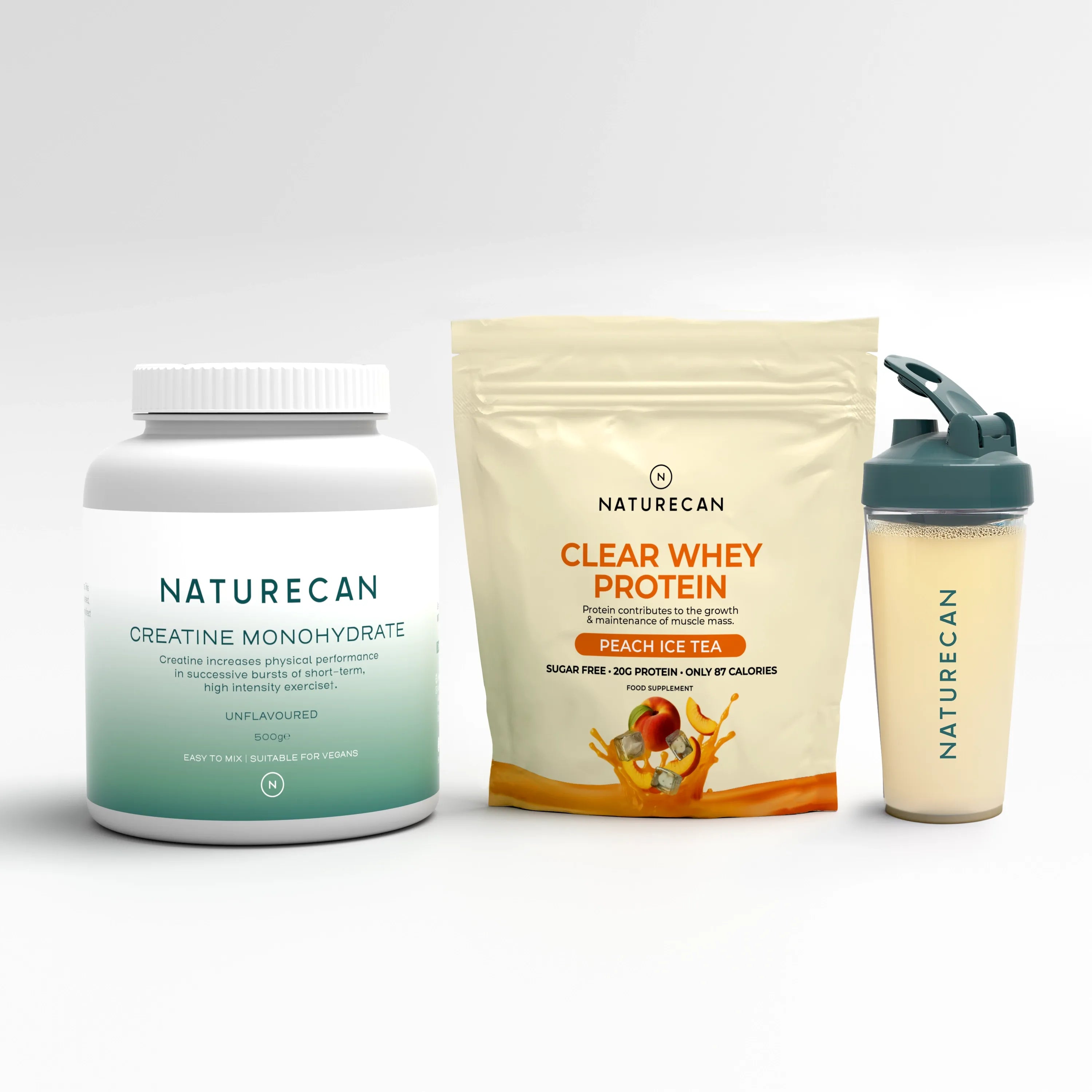 Naturecan fitness bundle with creatine monohydrate, peach ice tea clear whey protein, and a branded shaker bottle.