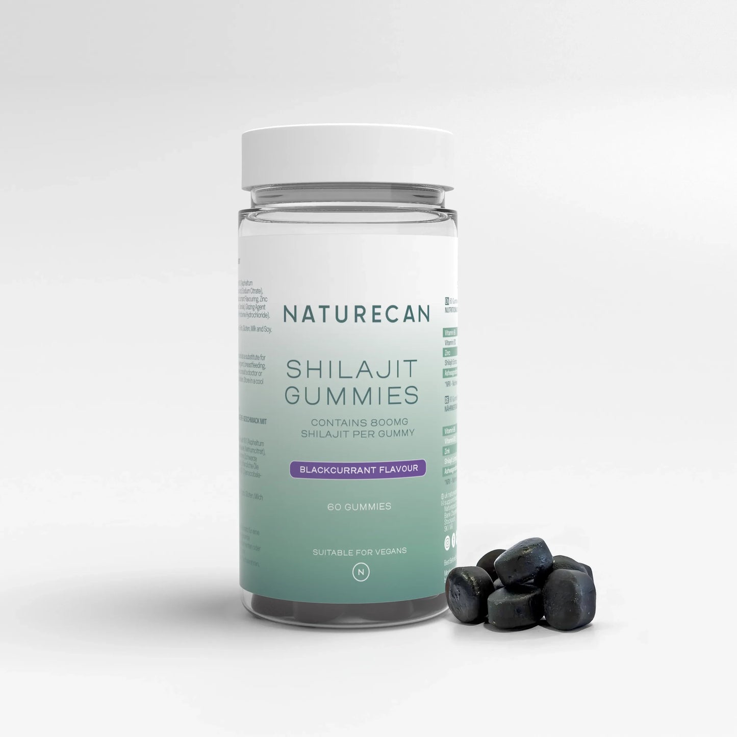 Naturecan Shilajit Gummies bottle with blackcurrant flavor, 60 vegan gummies, and scattered gummies beside it.
