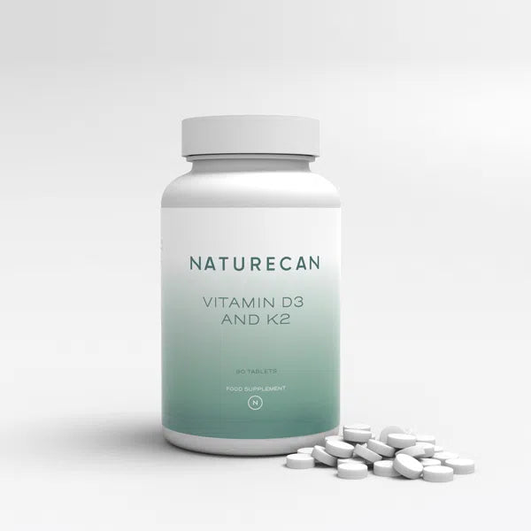 Naturecan Vitamin D3 and K2 supplement bottle with scattered tablets.