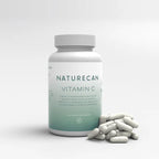 Naturecan Vitamin C bottle with scattered white capsules.