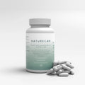 Naturecan Zinc and Magnesium capsules bottle with capsules scattered beside it.